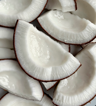 Close-up of sliced coconuts with a focus on texture and color.